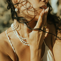 eos pearl earrings