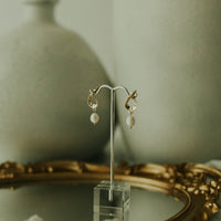 eos pearl earrings