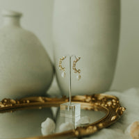 plutus pearl earrings