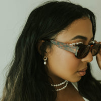 eos pearl earrings
